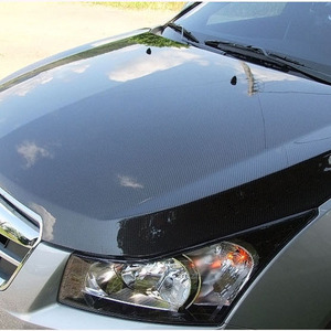 NẮP CAPO CARBON KHÔ LACETTI 2010